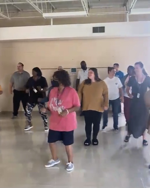 reed staff dancing in cafe