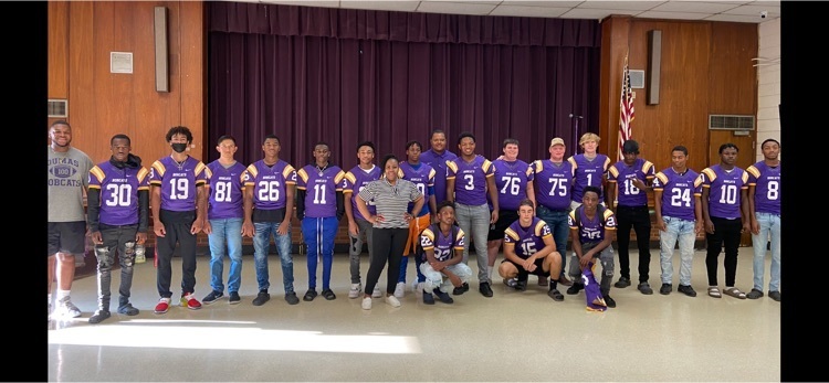 Bobcat Football Team, Coaches, and Dr. Evans