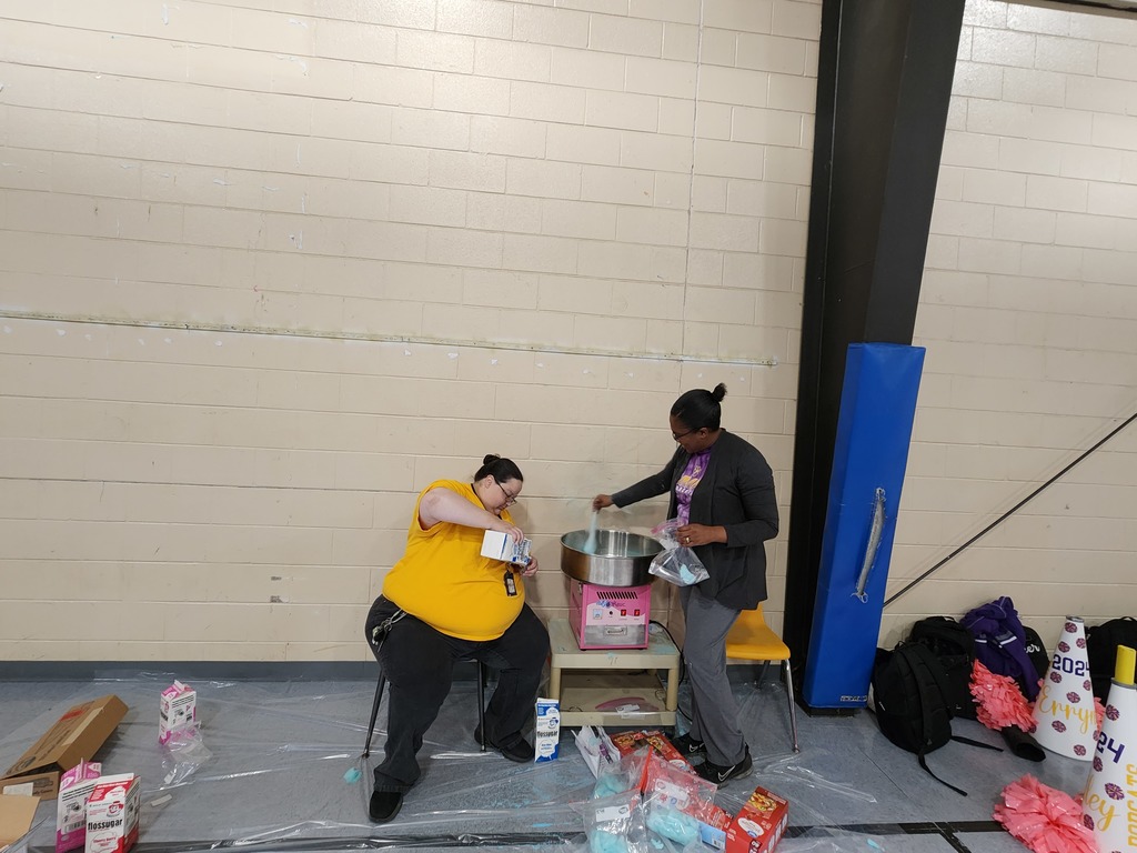 Ms. Albright and Mrs. Mitchell feeding the wall cotton candy!!